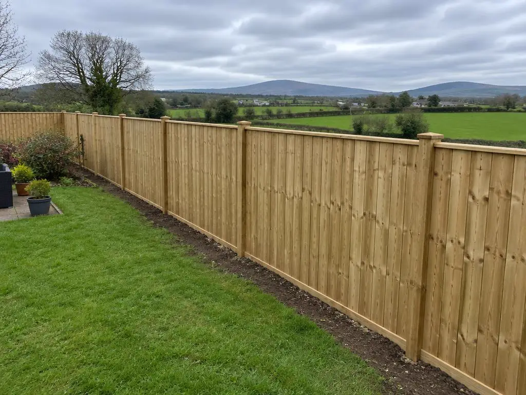 New close-board timber garden fence installed by a handyman in rural County Armagh